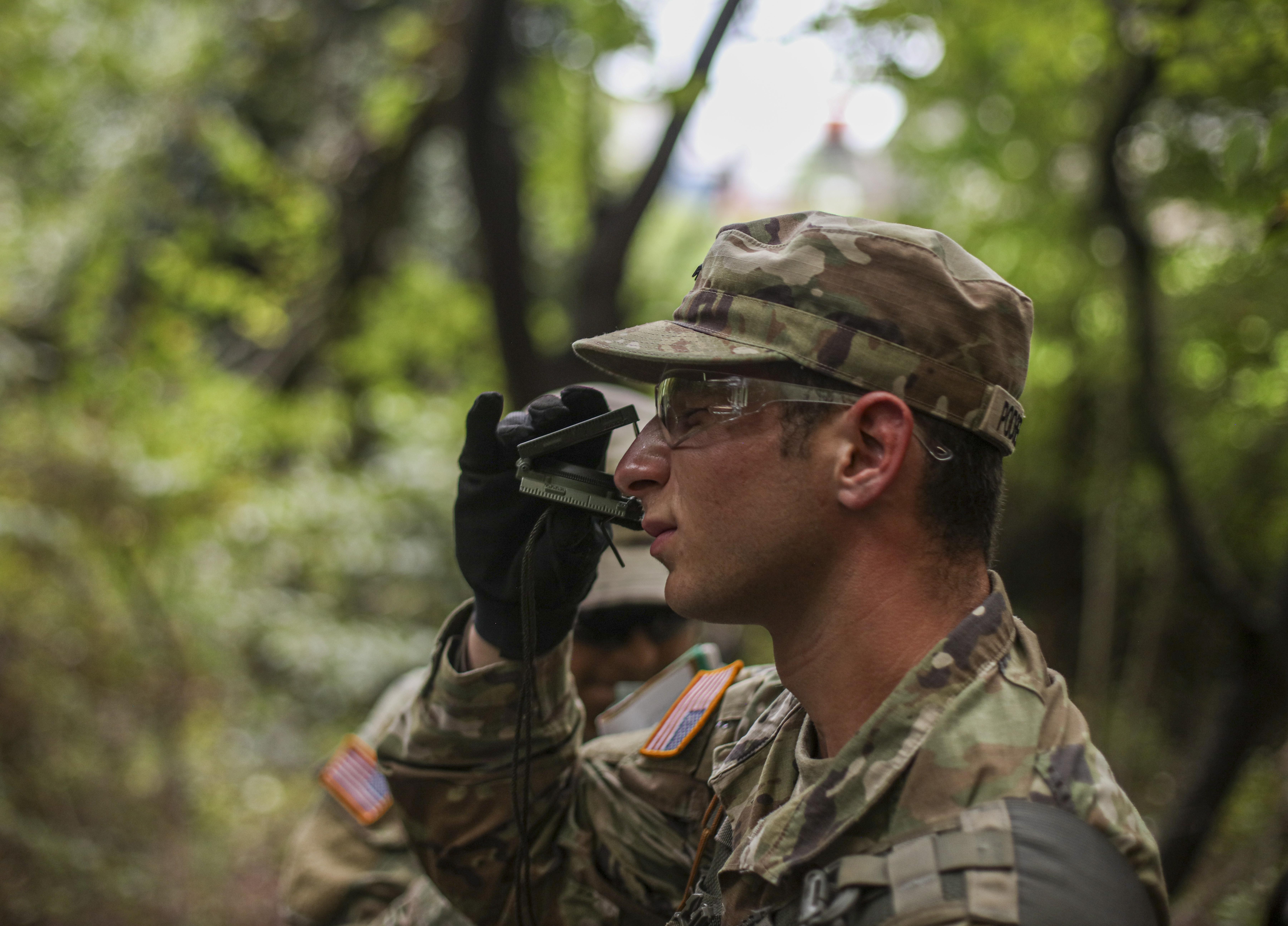 cadet in forest holding device