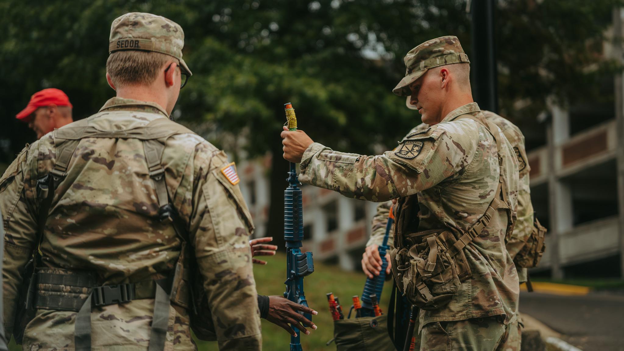 Army ROTC students preparing to do a shooting training