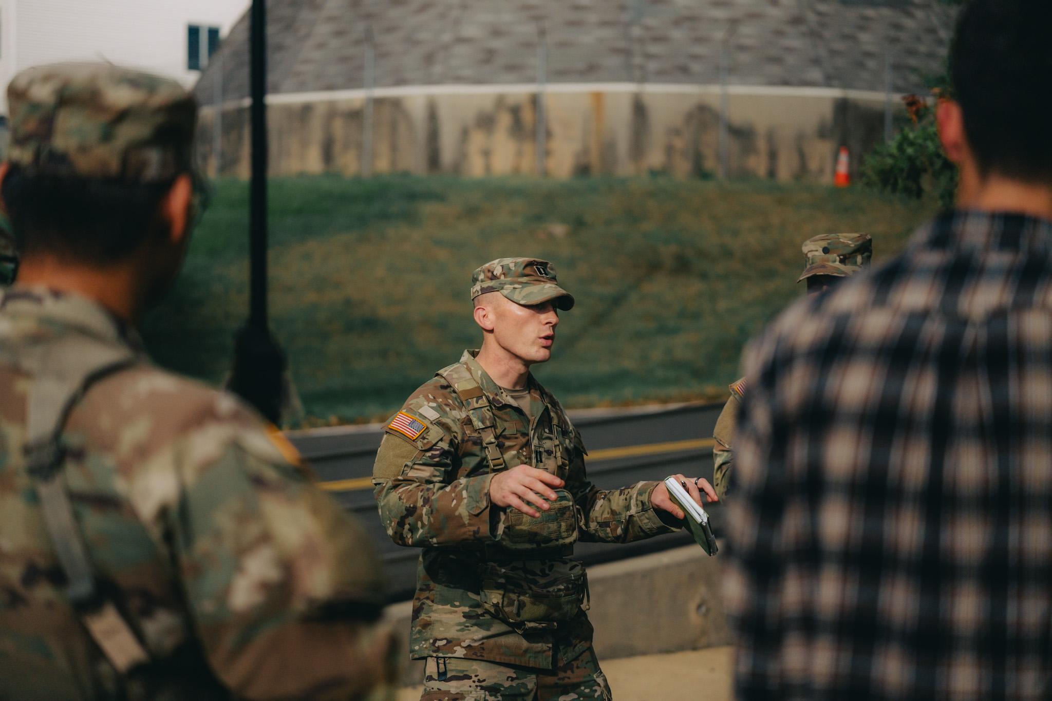 A cadre leader speaks to students